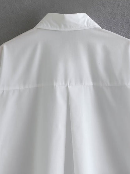 Camisa de manga larga con un solo bolsillo y cuello tipo polo de color blanco de verano para mujer