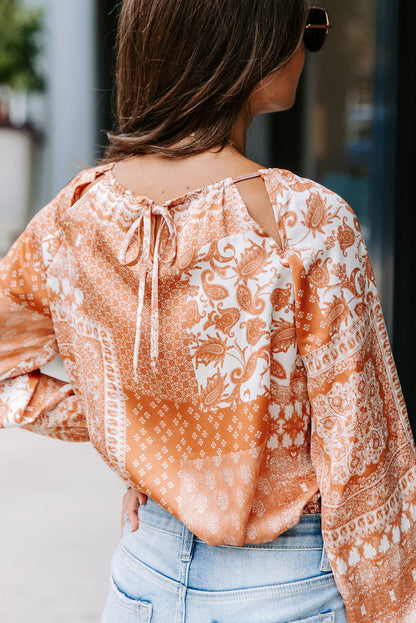 Orangefarbene Rundhalsbluse mit Kordelzug und Boho-Print