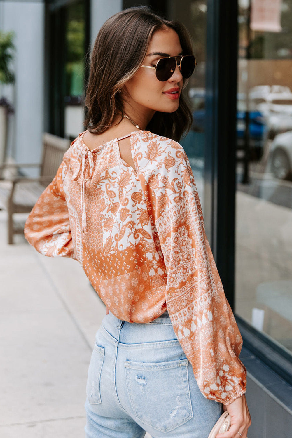 Orangefarbene Rundhalsbluse mit Kordelzug und Boho-Print