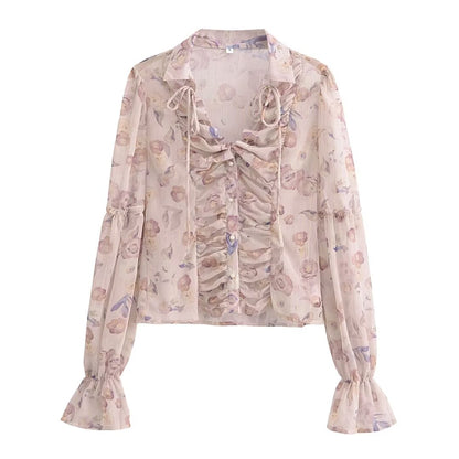 Primavera Chic con cuello de bufanda Camisa estampada de manga larga Top de mujer con manga decorativa de plumas