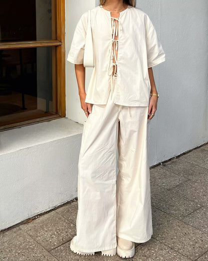 Conjunto de camisa de manga corta de color sólido con cordones en el pecho para mujer de primavera