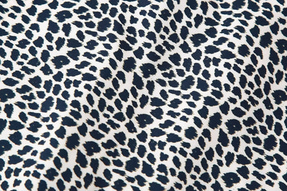 Camiseta de manga larga informal holgada con cordones y lazo de leopardo para mujer