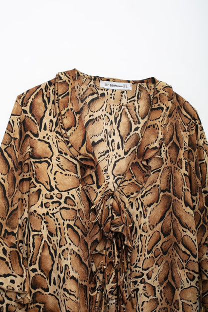 Fabricantes de ropa para mujer Camisa con estampado de leopardo y cuello en V para mujer Top holgado de manga larga con volantes