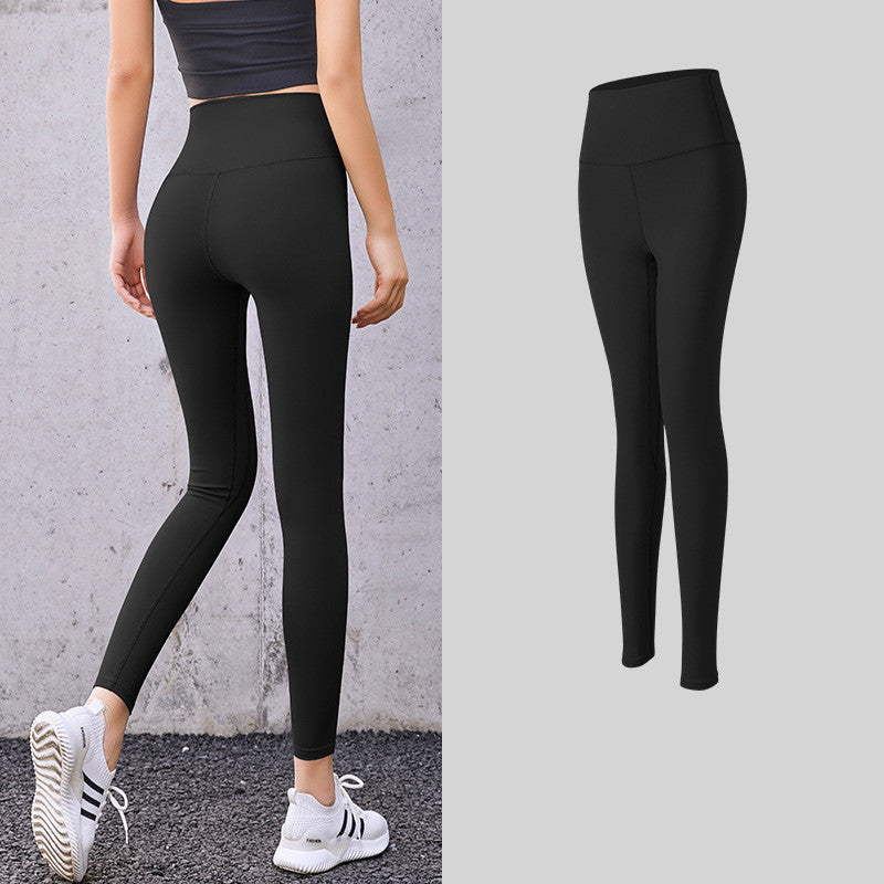 Enge, pfirsichfarbene Hüft-Leggings mit hoher Taille und Fitnesshose