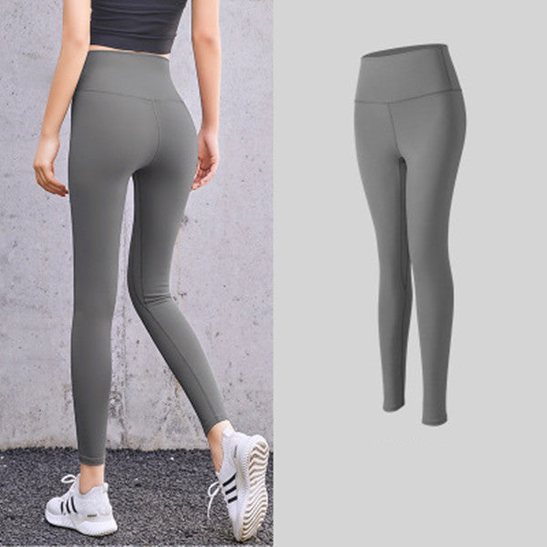 Enge, pfirsichfarbene Hüft-Leggings mit hoher Taille und Fitnesshose