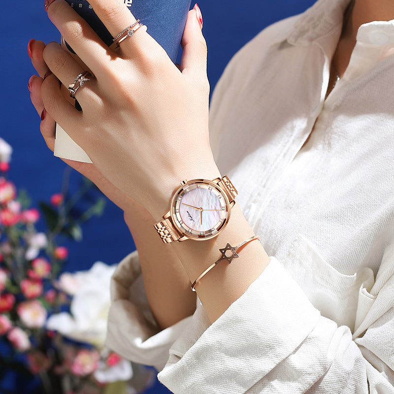Reloj de mujer Reloj de cuarzo con diamantes de imitación simple Tendencia