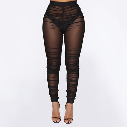 Leggings transparentes ajustados de malla plisada