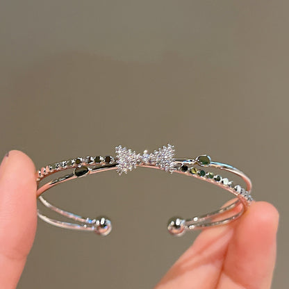 Modisches silbernes Nischen-Schleifenarmband für Damen