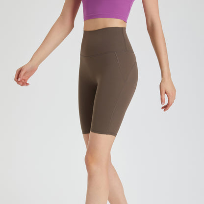 Ropa interior gratuita, pantalones de Yoga Zero Sense, pantalones cortos sin costuras con sensación desnuda y bolsillo trasero, pantalones deportivos ajustados con realce de cadera color melocotón