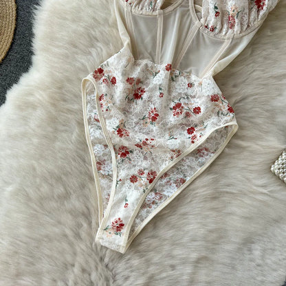 Monos sexys de encaje Floral a la moda, ropa moldeadora de malla con empalme de cuello Halter cruzado, monos ajustados, monos transparentes y sensuales Wanita