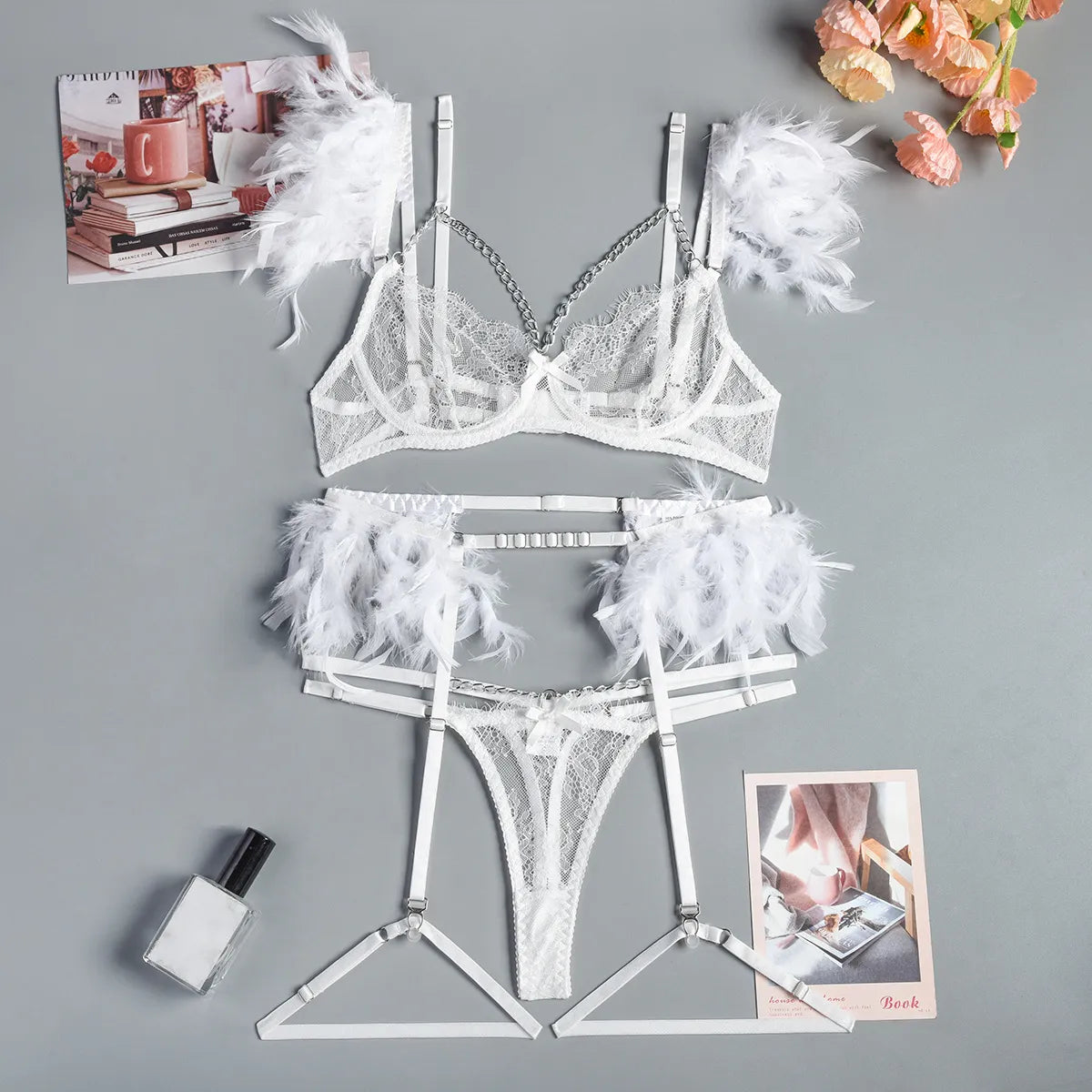 Conjuntos de lencería de plumas para mujer, conjunto de ropa interior de encaje con Tanga de lujo, conjunto de sujetador y bragas Sexy con liga de cadena Intim