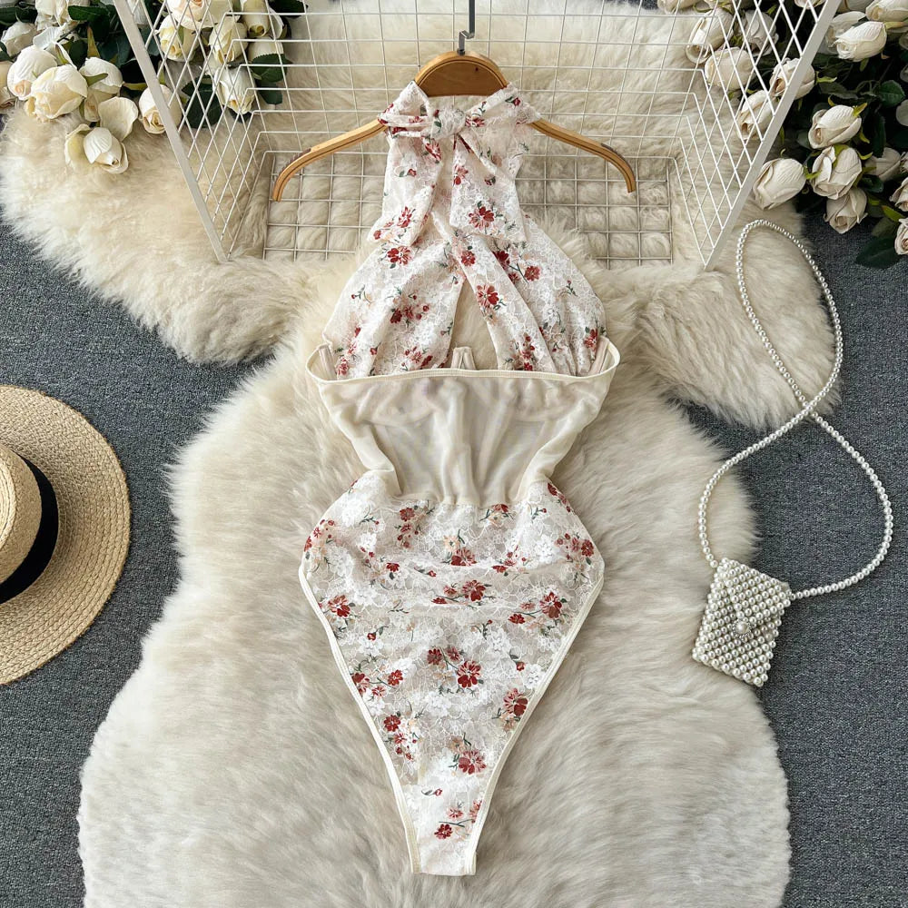 Monos sexys de encaje Floral a la moda, ropa moldeadora de malla con empalme de cuello Halter cruzado, monos ajustados, monos transparentes y sensuales Wanita