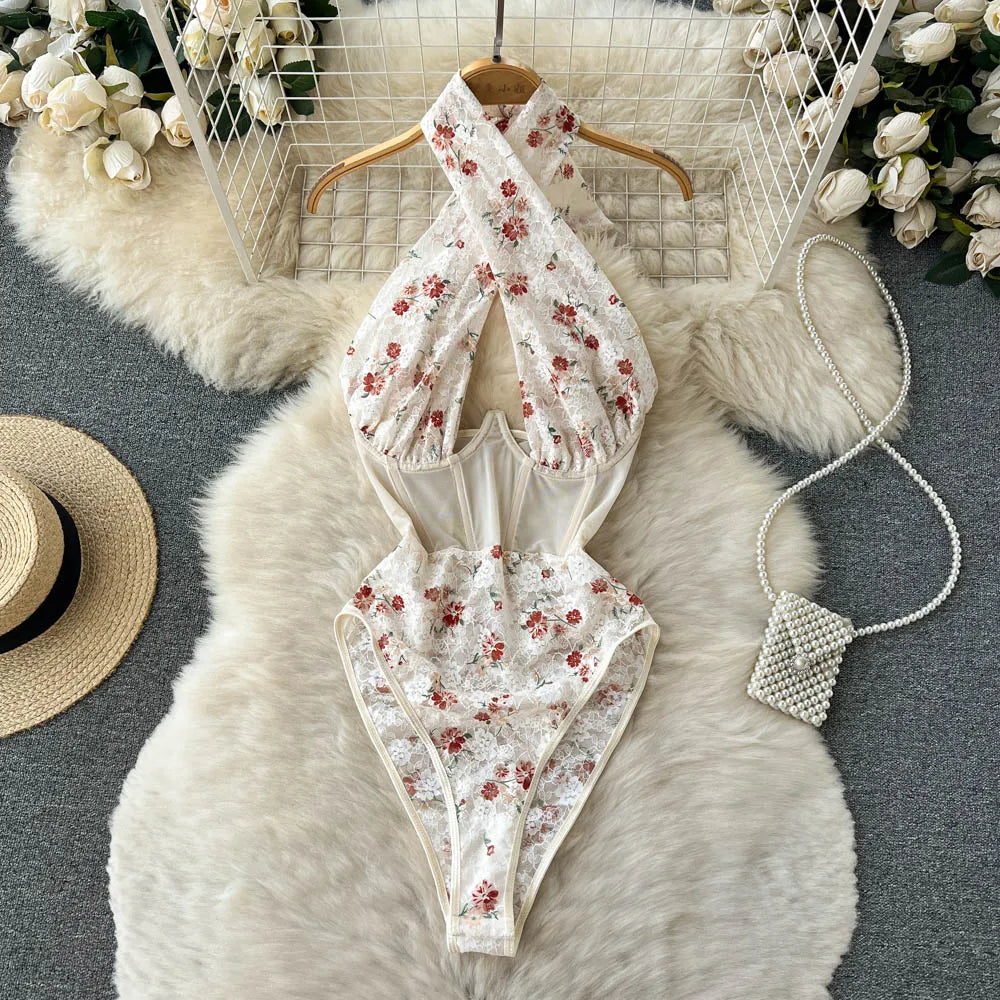 Monos sexys de encaje Floral a la moda, ropa moldeadora de malla con empalme de cuello Halter cruzado, monos ajustados, monos transparentes y sensuales Wanita