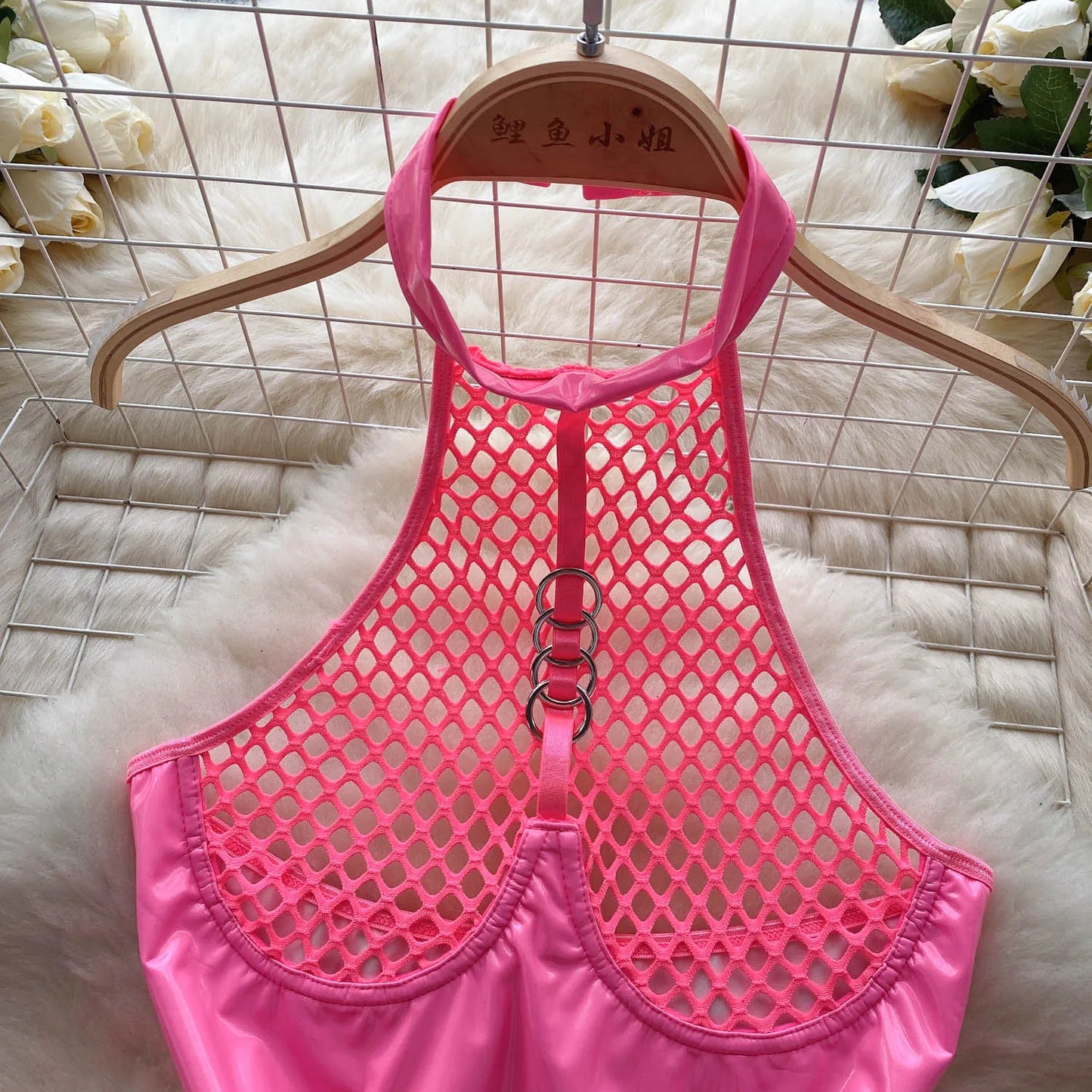 Monos sexys de cuero PU para mujer, petos con falda Pongee de malla de retales con cuello Halter, monos ajustados calados Wanita