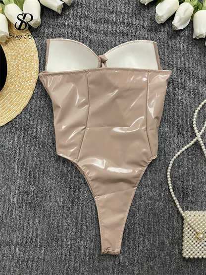 Trägerloser PU-Leder-reizvoller Spielanzug-Frauen-elastischer Taillen-dünner rückenfreier Overall Streetwear-französischer Retro- Strand-Bodysuit Wanita