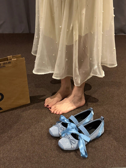 Este par de zapatillas de ballet azules