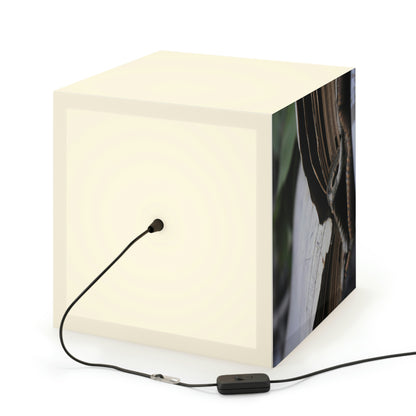 Unbeknownst to its readers, the book possesses magical powers.

"The Forgotten Tome of Magic" - The Alien Light Cube Lamp