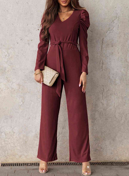 Langer Jumpsuit mit V-Ausschnitt und Puffärmeln und Gürtel