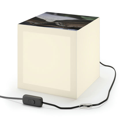 Unbeknownst to its readers, the book possesses magical powers.

"The Forgotten Tome of Magic" - The Alien Light Cube Lamp