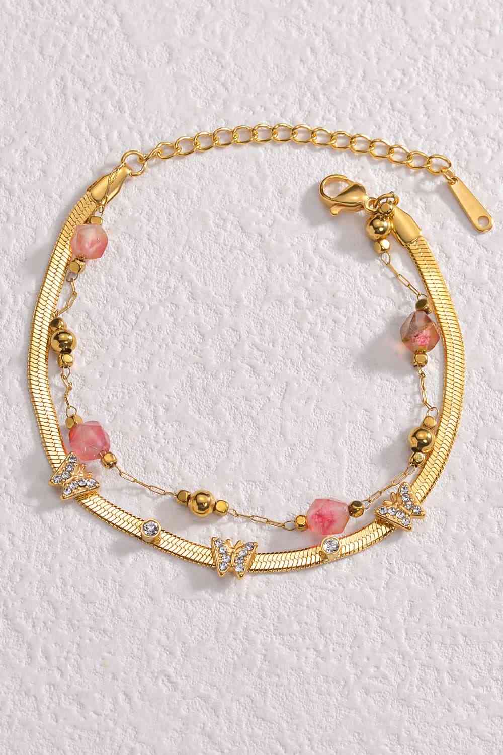 Pulsera de doble capa con mariposa decorativa y circonitas