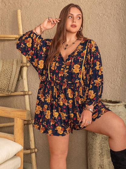 Plus-Size-Strampler mit Blumenmuster und Ballonärmeln und Bindekragen