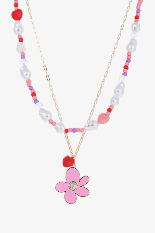 Mehrschichtige Halskette mit Blumen- und Herz-Anhänger