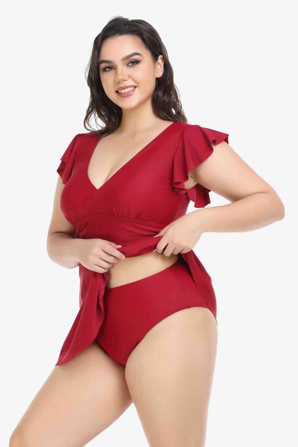 Conjunto de pantalón y vestido de baño escotado con volantes de talla grande