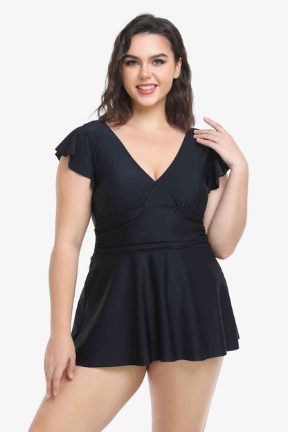 Plus-Size-Set aus gerüschtem Badekleid und Badehose mit tiefem Ausschnitt