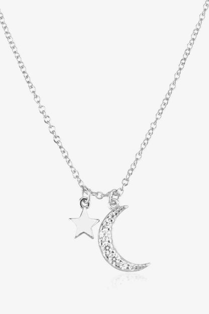 Collar con colgante de estrella y luna de circonitas