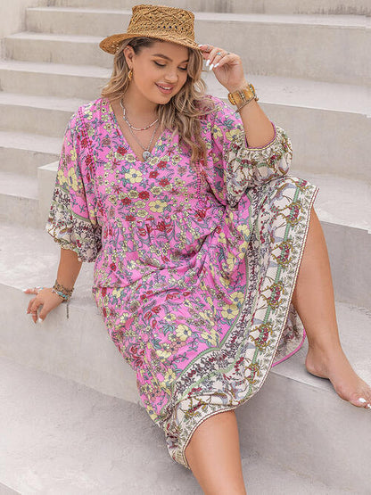 Plus-Size-Midikleid mit Blumenmuster und V-Ausschnitt und Ballonärmeln