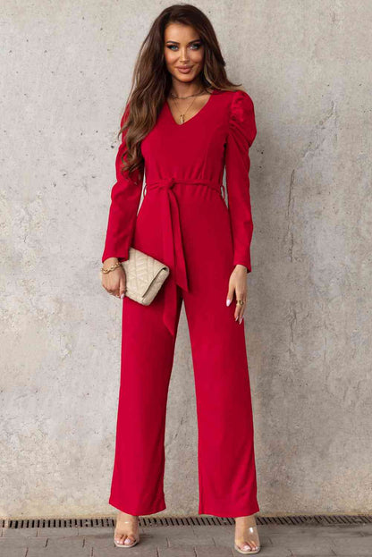 Langer Jumpsuit mit V-Ausschnitt und Puffärmeln und Gürtel