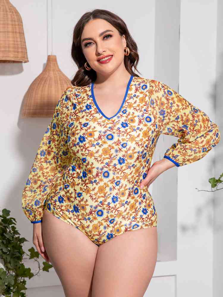 Traje de baño de una pieza de manga larga con espalda abierta y estampado floral de talla grande