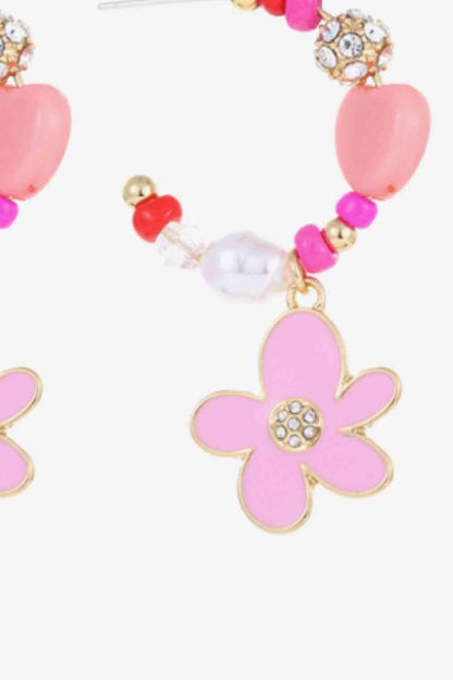 Pendientes colgantes con forma de C y flores