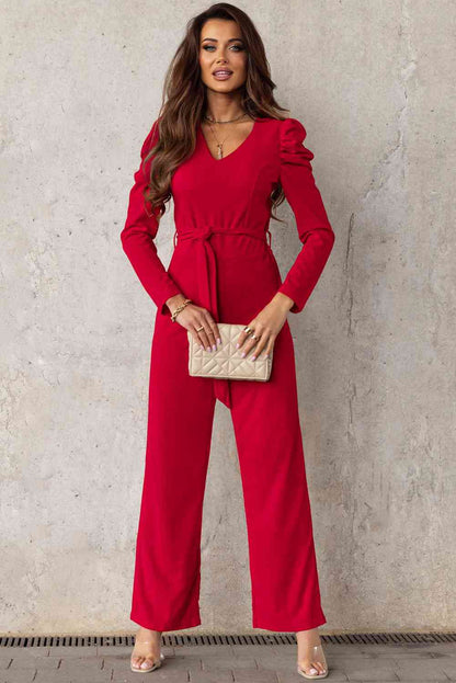 Langer Jumpsuit mit V-Ausschnitt und Puffärmeln und Gürtel