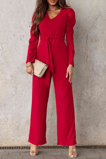 Langer Jumpsuit mit V-Ausschnitt und Puffärmeln und Gürtel