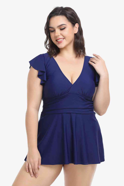 Plus-Size-Set aus gerüschtem Badekleid und Badehose mit tiefem Ausschnitt