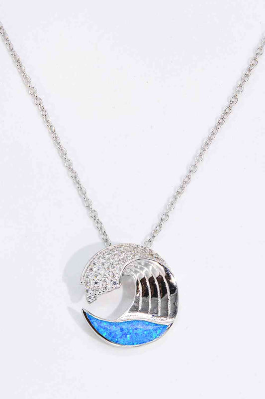 Halskette mit Wellenanhänger aus Opal und Zirkon