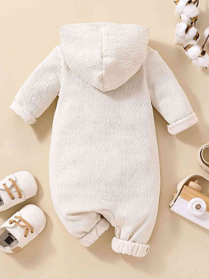 Strukturierter Baby-Jumpsuit mit Kapuze und Knopfleiste vorne und Taschen