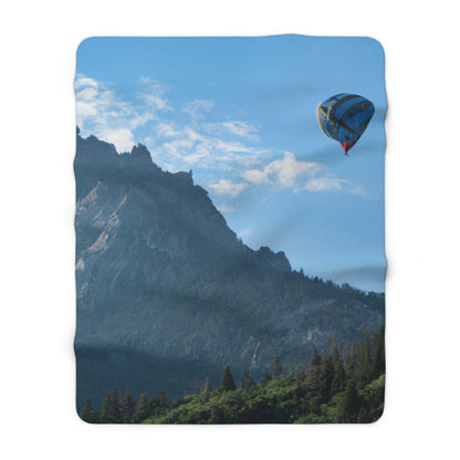 "Soaring Over Splendor: A Balloon Journey Through the Mountains" - The Alien Sherpa Fleece Blanket