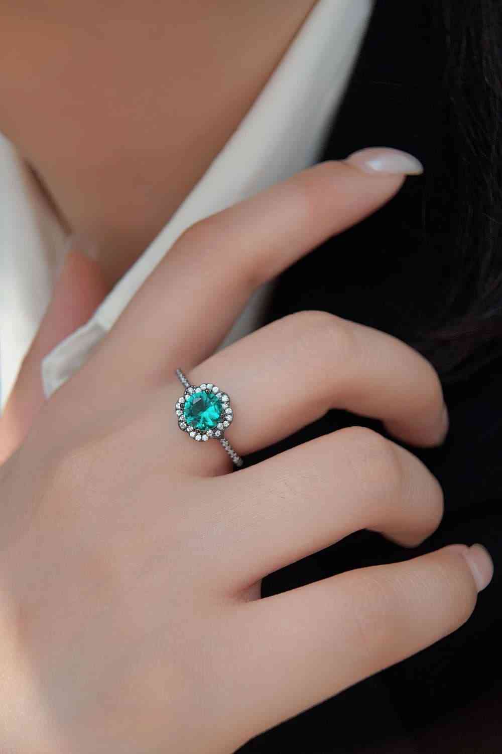 Paraiba-Ring in Blumenform mit blauem Zirkon