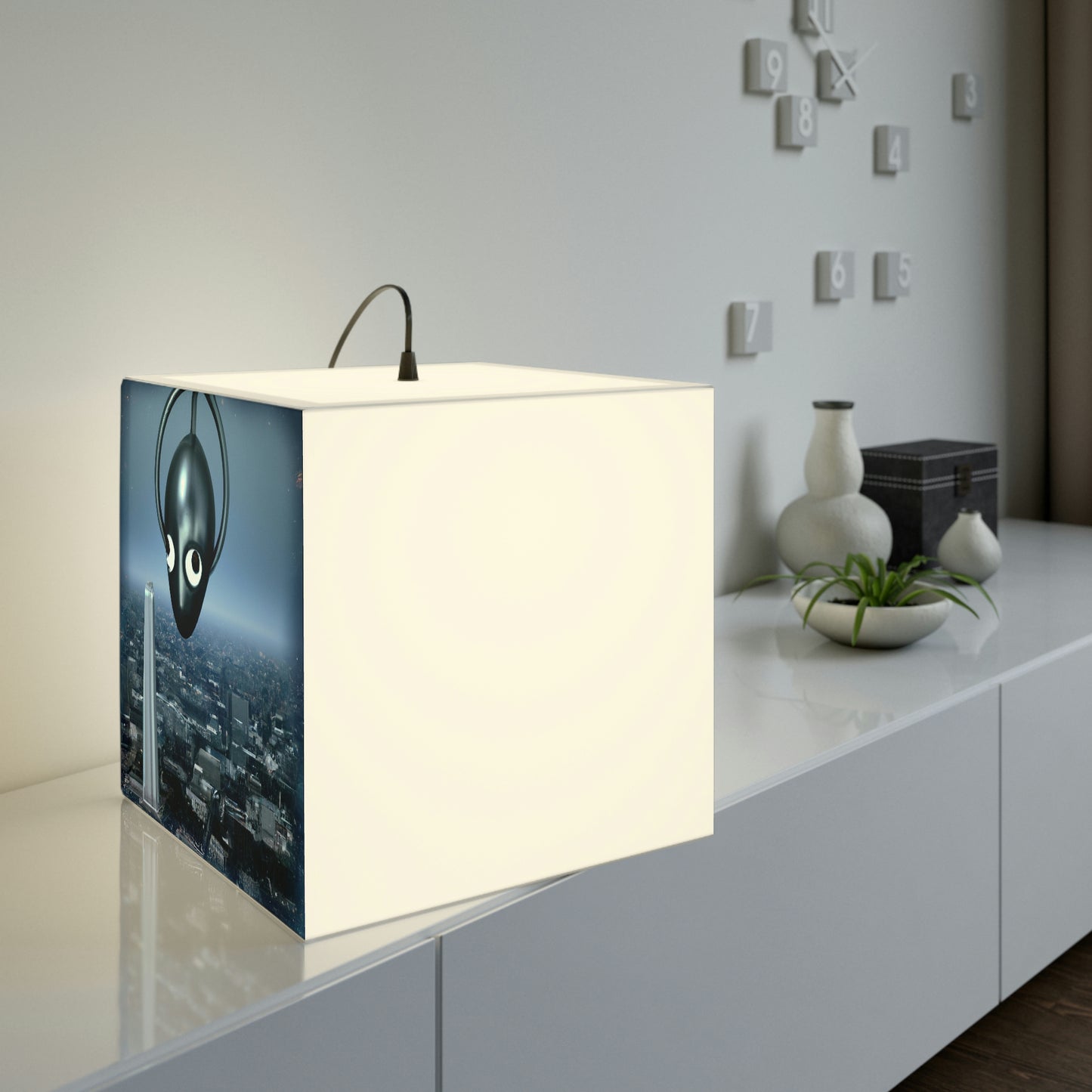 "A Distant Spark: An Alien's Search for Sanctuary in the City." - The Alien Light Cube Lamp