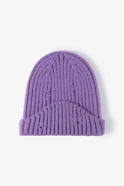 Gorro de punto de canalé desgastado